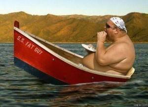 Fat guy in a boat from lolpix.com.